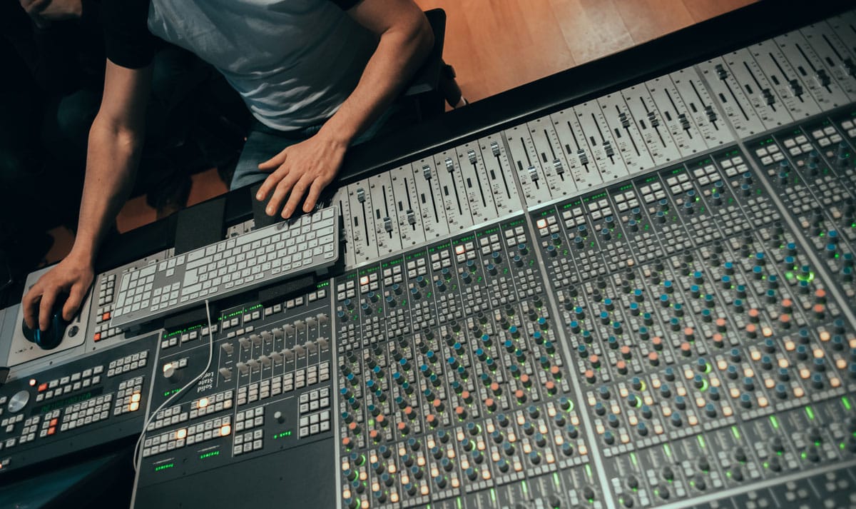 sound engineer at work in recording studio